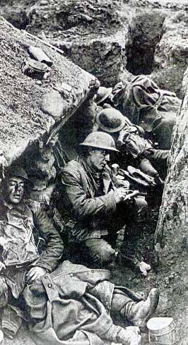 Writing a letter in a trench in the Great War