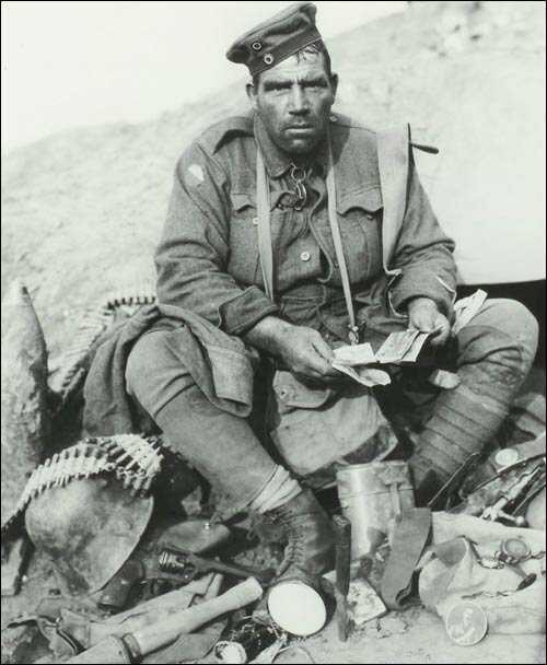 Private Barney Hines with a collection of war souvenirs